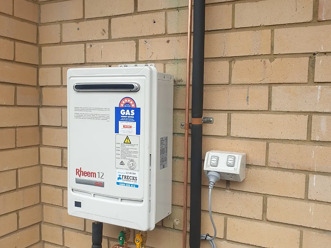 Rheem continuous-flow gas hot water unit installed by Frecks Plumbing & Gas in Perth's southern suburbs